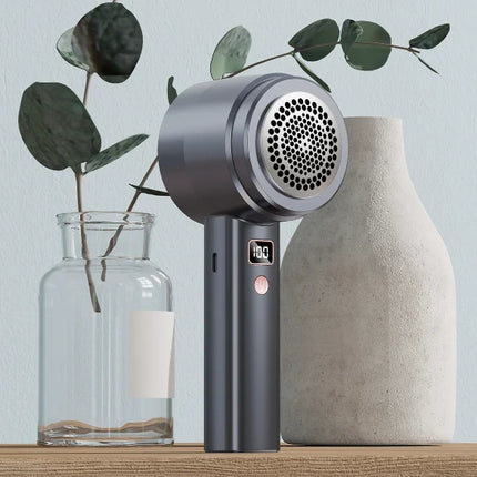 Effektiv luddborttagare med display - gör textilier som nya